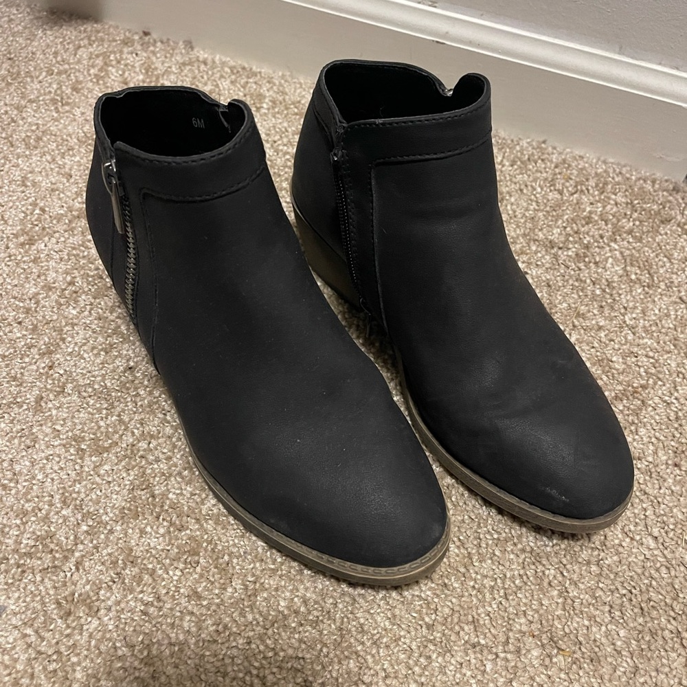 Maurice’s black ankle boots.
